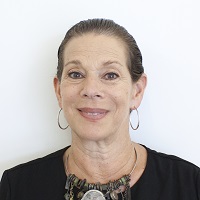 Sharp printed photo of a woman on matte paper.