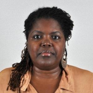 Photo of a woman with her full face visible not wearing glasses.