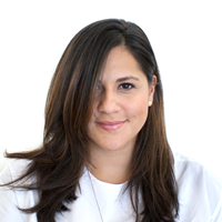 Photo of a woman with her hair blocking part of her face. 