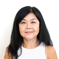Photo of a woman against a white background. 