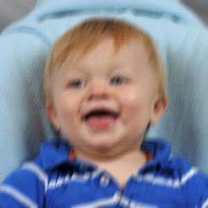 Blurry photo of a toddler.