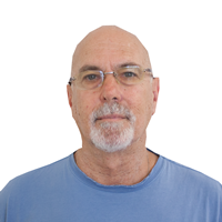 Photo of man with background digitally cropped. 